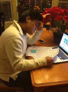 Andrew Cho filling out his FAFSA application.